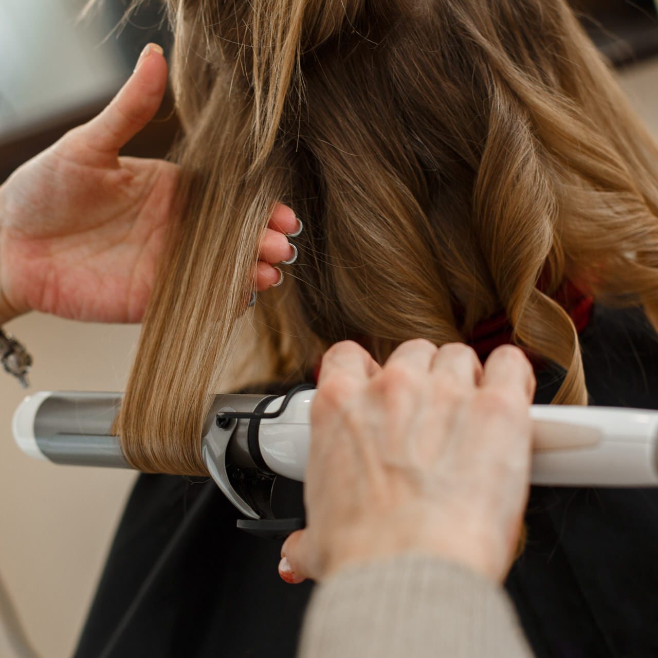 professional-hairdresser-working-with-client-salon-hairstyle-master-makes-evening-hairstyle